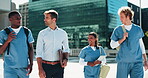 City, commute and medical students walking with professor for conversation, development or education. Healthcare, medicine and school with group of people downtown for travel to clinic or hospital