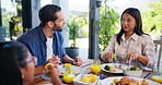 Family dinner, parents and chat with salad for happy conversation, love or bonding together on patio. Father, mother and daughter for lunch, eating or relax with care, smile or laugh outside house
