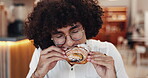 Man, croissant and eating pastry in coffee shop, hungry and bite of delicious snack in bistro. Sweet food, male person and bakery customer with confectionery craving, meal treat and local restaurant