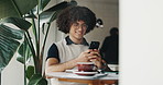 Happy, coffee shop and man with phone to relax on social media, connection and typing message. Restaurant, cafe and person on smartphone for internet, website and chat with drink, beverage and latte
