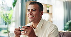 Aroma, coffee and thinking with man on sofa in living room of home for weekend relax or wellness. Drink, scent and smile with happy person in apartment to enjoy caffeine beverage for satisfaction