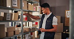 Tablet, shelf and man in warehouse for stock check, inspection and supply chain for fashion business. Box, inventory and worker with technology for logistics, shipping and quality control in startup