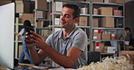 Supply chain, distribution and businessman with phone for delivery, logistics and inventory for ecommerce. Courier, warehouse and employee texting distributor for planning, shipping or supplier stock