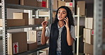 Phone call, shipping and woman with boxes for delivery, logistics and distribution in warehouse. Ecommerce, business and person on smartphone talking for supply chain, contact and online inventory