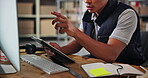 Man, computer and tablet in office for logistics, supplier distribution and research for startup. Warehouse, male person and seller with digital website for supply chain, business service or pointing