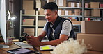 Phone, small business and man in warehouse for distribution stock with cardboard boxes on shelf. Digital technology, mobile app or logistics worker checking online order, packages or ecommerce parcel