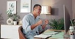 Computer, fist pump and winner with man in home office for celebration of remote work success. Bonus, goals and target with happy freelance employee reading good news of promotion in apartment
