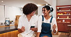 Friends, people and phone with dancing in cafe for social media sound, bonding together and audio playlist. Gen z, happy and laughing in restaurant with radio, streaming service and funny movement