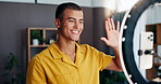 Happy man, influencer or wave with ring light or phone for blog, introduction or online tutorial at home. Male person, vlogger or mobile smartphone with smile for video recording, social media or app