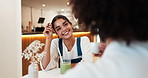 Couple, date and talking with flirting in cafe for connection, bonding together and romance. Care, happy people and drinks with discussion in restaurant for relationship, weekend break and relax