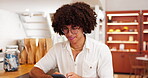 Man, typing message and online in shop, business owner and chat to supplier for update. Happy person, communication and digital calendar to schedule tasks, website and worker reading email response
