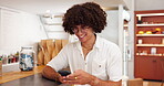 Man, typing message and online in coffee shop, business owner and chat to supplier for update. Happy person, communication and digital calendar to schedule tasks, website and reading email response