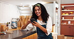 Woman, online scroll and laughing in store, business owner and chat to supplier for update. Happy person, communication and digital app to schedule tasks, website and reading funny email response