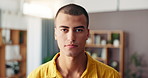 Serious, confident and face of man in new home with calm for weekend break in living room. Pride, real estate and portrait of young male person from Mexico with apartment in lounge for relax.