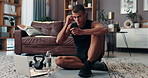 Laptop, fitness and music with man in living room for streaming workout class, learning and health. Exercise, wellness and training with person and home gym for sports, virtual course and online