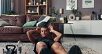 Laptop, training and crunches with man in living room for streaming workout class, learning and health. Exercise, wellness and fitness with person and home gym for sports, virtual course and online
