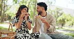 Pizza, couple and happy with picnic at park for outdoor date, eating fast food and bonding together. Romance, people and relax with lunch in nature for takeaway meal, hungry and relationship support