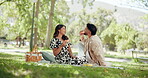 Pizza, couple and laughing with picnic at park for romantic date, eating fast food or funny conversation. Love, people or relax with lunch outdoor for bonding together, hungry or relationship support