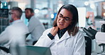 Scientist, woman and laptop with neck pain in laboratory for medical research, deadline stress or overtime burnout. Night, massage and shoulder strain of vaccine study, drug development or overworked
