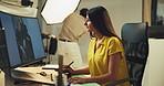 Woman, photoshoot or photo editor on computer in studio for checking image design or creative magazine. Backstage, picture or person on technology for production retouching digital media or agency