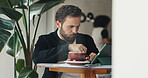 Tablet, research and business man in cafe for  planning, remote worker and hospitality manager. Restaurant schedule, writing and coffee shop budget with person for notebook, research or idea