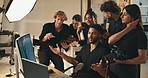 Photography, teamwork and monitor with man in studio for fashion model, planning and editing process. Laptop photoshoot and catalog for media project with people on set for behind the scenes director