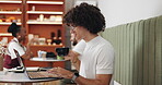 Coffee, laptop and remote work with man in cafe to research small business or startup information. Computer, drink and typing with freelance employee person in restaurant as journalist or writer