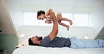 Playing, father and child with airplane on bed for lifting game, support and weekend fun in home. Flying, man and bonding with baby in bedroom for connection, trust and relationship with love or care