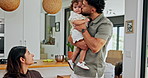 Home, man and kiss family goodbye in morning for greeting, relationship or leaving for work. Love, affection or dad with baby to woman for bonding, security and connection with support, care or trust