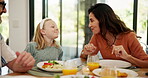 Happy, family and child talking with food at dinner table, healthy lunch and nutrition meal in lounge. Smile, mother and discussion with diet vegetables of brunch, parent bonding and playful at house