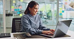 Office, businesswoman and smile with laptop for information, article research and proofreading. Career, female person and journalist in creative agency for news publication, typing blog and editing