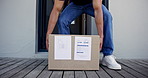 House, front door and man with box, delivery and logistics with package, shipping order and ecommerce. Cardboard, apartment and consumer with product, person and courier service with safe parcel