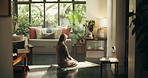 Muslim, prayer and woman in home for religion, worship and praise to Allah in living room. Religious faith, spiritual and Islamic person on mat for Ramadan Kareem, salaah and praying for fasting