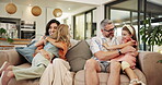Hug, love and relax with family on sofa in living room for bonding, support and care. Happiness, weekend and trust with parents and children in lounge of home for relationship, embrace and smile