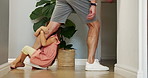Home, naughty and father with girl, leg and frustrated with dragging, bedtime and walking. Closeup, apartment and dad with daughter, parent and expression with tantrum, discipline and autism