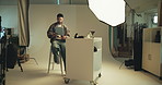Man, photographer and check on tablet in studio with photoshoot results, editing and catalog. Photography, digital and retouch process in backstage to review picture, production and magazine industry