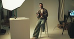 Face, man and photographer on camera in studio for photoshoot results, editing and catalog. Photography, digital and retouch process in backstage to review picture, production and magazine industry

