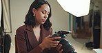 Woman, photographer and check on camera in studio of photoshoot results, editing and catalog. Photography, digital and retouch process in backstage to review picture, production and magazine industry