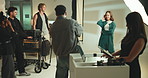 Project, photographer and camera with people in studio for ecommerce catalog, production and model. Creative team, photoshoot and backstage with men and women on set for filming a brand campaign