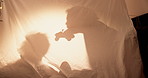 Tent, home and father with family, games and storytelling with weekend break, love and relax. Parent, apartment and child in living room, toys and bonding together with fun, playing and shadow