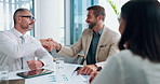 Handshake, clients and people in boardroom, smile or agreement to deal in business, paperwork or joy. Shaking hands, colleagues and happy for collaboration in office, meeting or success of investment