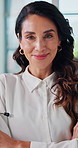 Healthcare, doctor and face of woman for arms crossed, about us and professional career with happiness. Hospital, mature cardiologist and portrait with confidence for medical help, service and pride