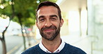 Business man, face and smile in street for commute, travel and outdoor with confidence in city. Professional person, happy and pride in portrait on urban sidewalk for career, job and road in Italy