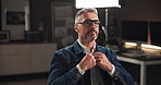 Set, man and preparation for film, production or interview with mature celebrity. Creative, fashion and art director in studio getting ready with glasses for tv show, media and live stream broadcast
