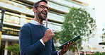 Business man, tablet and celebration in city, deal and excited on application with bonus in street. Person, touchscreen and win with fist pump, smile and cheers for goal on urban sidewalk in France