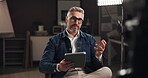 Tablet, influencer and live streaming with man in studio for social media, content creation and vlogger. Subscription channel, virtual interview and viral with mature person and recording for filming