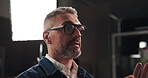 Studio, broadcast and man with interview, talk show or entrepreneur on live stream, discussion or chat. Entertainment, advice and mature person with glasses on vlog, social media or tips for business