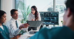 Hospital, teamwork and people with laptop, talking and colleagues with documents, planning and boardroom. Healthcare, medical professional and meeting for treatment options, brain scan and discussion
