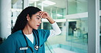Stress, woman and surgeon thinking in hospital of healthcare mistake, medical crisis and burnout risk. Tired, depression and nurse in clinic with anxiety, bad news and surgery treatment disaster
