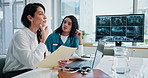 Women, doctors and meeting with x ray, laptop and review for documents, team or plan dental surgery at clinic. Mentor, surgeon and dentist with teeth, jaw injury and analysis in hospital boardroom